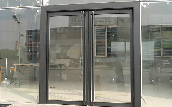 额敏玻璃地弹门